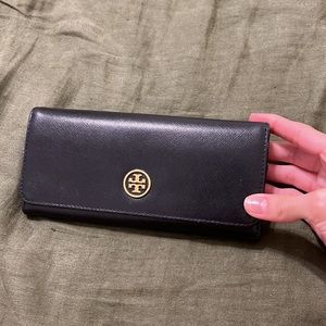 Tory Burch long leather black wallet missing a snap side can be easily fixed